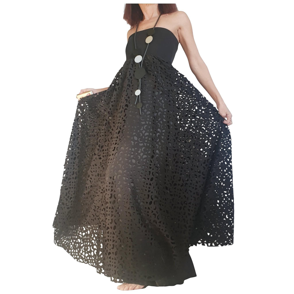 dreSSShoescode black polyester neoprene maxi skirt dress with intricate cut-out pattern and layered effect.